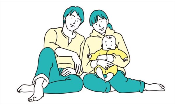 乳児を養育する若い男女のカップル