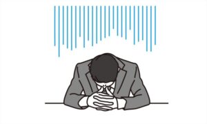 失敗して落ち込む男性ビジネスパーソン