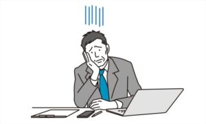困り果てる中年の男性ビジネスパーソン