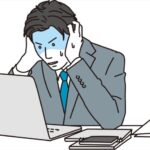 ミスして焦る男性ビジネスパーソン